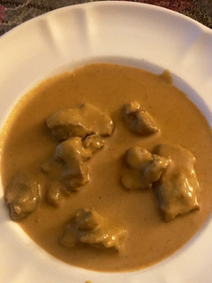 Una foto de Mollejas con salsa de verduras y queso