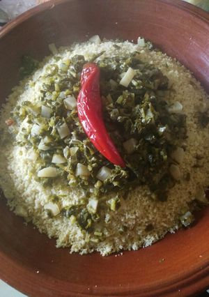 A picture of Couscous with Turnip Greens (Ousay).