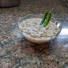 A picture of Restaurant style smokey boondi raita.