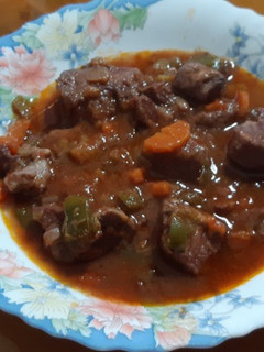 Una foto de Carne en salsa de vino