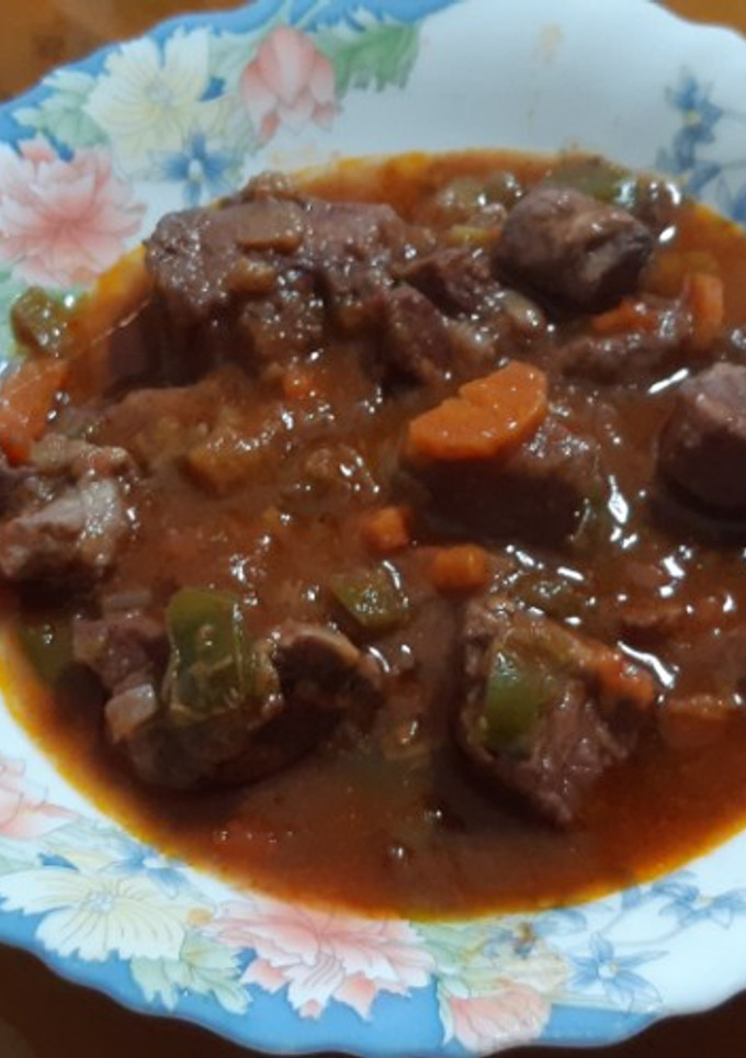 Una foto de Carne en salsa de vino