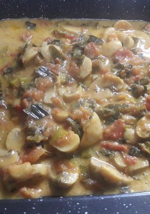 Una foto de Champiñones al verdeo con crema
