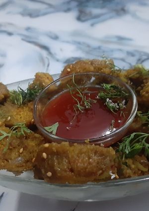 દૂધી ના મુઠીયા (Dudhi Muthiya Recipe In Gujarati) રેસીપી મુખ્ય ફોટો