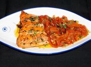 Una foto de filete al perejil
