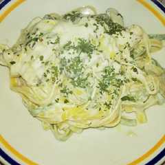 A picture of Tagliatelle Paglia e Fieno with Cardoncelli Mushrooms and Cream.