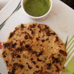 A picture of Oats and green moong Chilla.