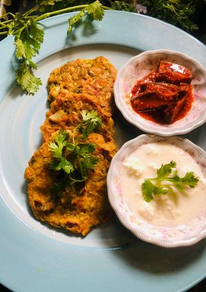A picture of Barely veggie pancake or Thalipith.