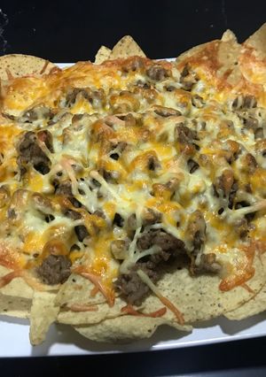 A picture of Nachos with Cheese and Beef.