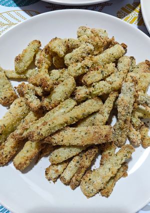Una foto de Tronquitos de brócoli rebozados en air fryer