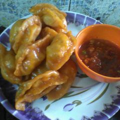 A picture of Tomato egg momo.