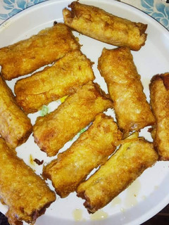 A picture of Sausage wrapped in bread.