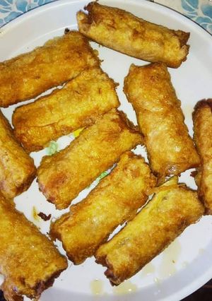 A picture of Sausage wrapped in bread.