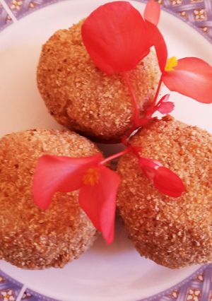 Una foto de Bombas de papa y cebolla caramelizada sin gluten y vegan