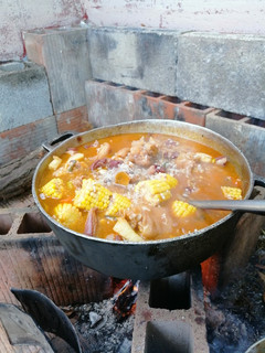 Una foto de Guacho de Cerdo & Frijoles a Leña
