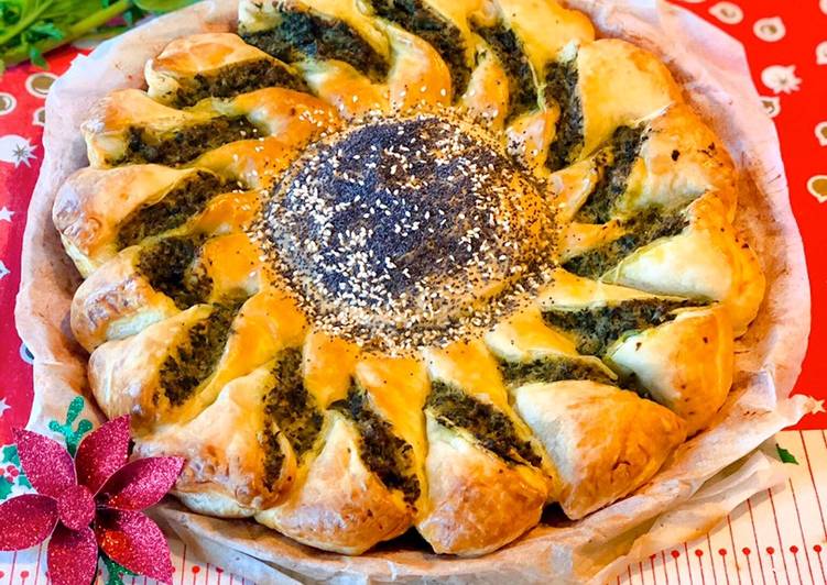 Ricetta Girasole Di Pasta Sfoglia Con Cime Di Rapa E Ricotta Di Viaggiare In Cucina Cookpad