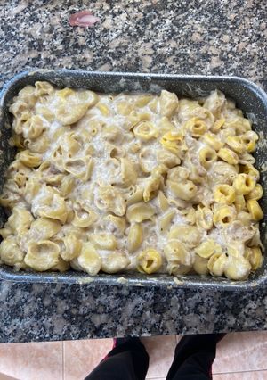 Foto principal de Pasta rellena de queso de cabra, nueces y cebolla caramelizada
