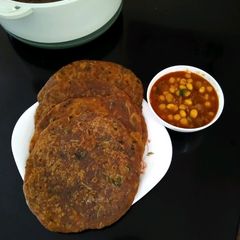 A picture of Coriander mint and carrot Parathas with Chole.