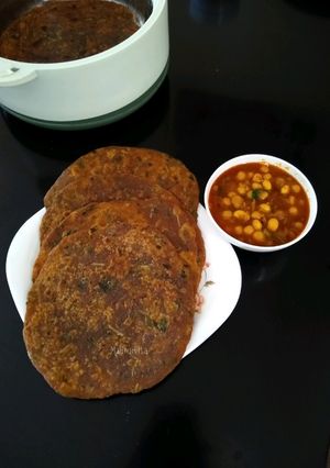 A picture of Coriander mint and carrot Parathas with Chole.