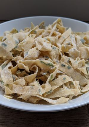 A picture of Pasta with parsley.