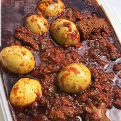 A picture of Ofada Stew/ palm oil stew.