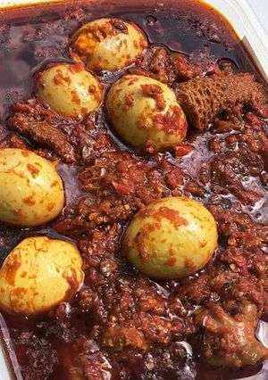 A picture of Ofada Stew/ palm oil stew.