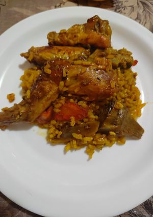 Foto principal de Arroz con conejo, pollo y alcachofas