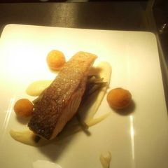 A picture of Salmon, pomme douphines celeriac puree, green breans.