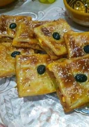 صورة لوصفة 🥪 كوكا بدون 🌮 عجينة مورقة 🍝