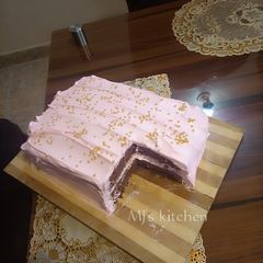 A picture of Chocolate Slab cake with strawberry frosting.