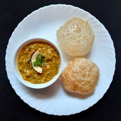 A picture of Louki aur Chane Dal ki Sabzi / Lau diye Cholar Dal.
