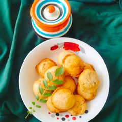 A picture of MINI MASALA PANIYARAM (made from Idli Batter).