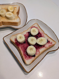 A picture of Open-Faced Sandwich with Your Favorite Jam and Banana.