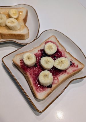 A picture of Open-Faced Sandwich with Your Favorite Jam and Banana.