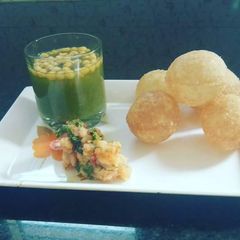 A picture of Pineapple pani poori.
