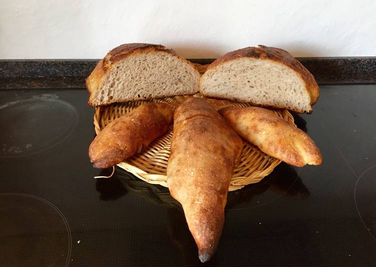 Grahams/manitobahvedebrød med øl og surdej. Et brød bagt i gryde, boller og baguetter på stålplade