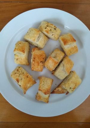 Una foto de Pancitos de “nunca es mucho” ajo y queso