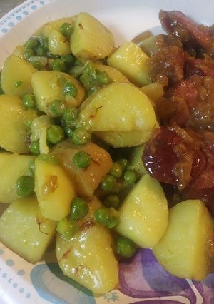 A picture of Saffron Flowers with English Peas and Potatoes.