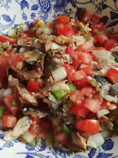 Una foto de Aliño de sardinas asadas