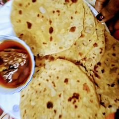 A picture of Spicy Spread Cheese Parathas.