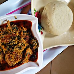 A picture of Pounded yam with Equsi soup.