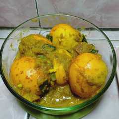 รูปของ Telur bumbu kunyit kencur