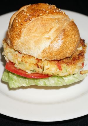 A picture of Crab burgers on homemade sesame seed buns.
