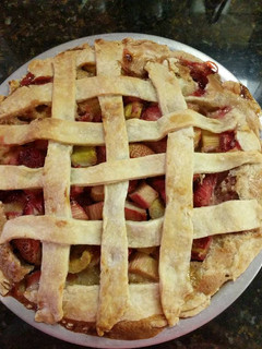 A picture of Strawberry rhubarb custard pie.