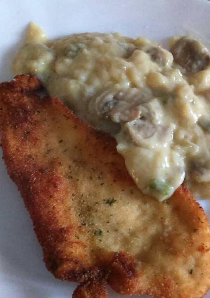 Una foto de Pechugas empanadas con bechamel de champiñones