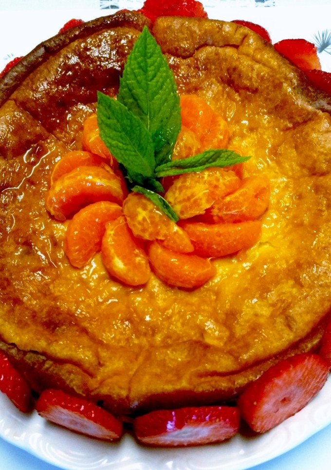 Una foto de Tarta de queso con mandarina