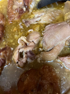 A picture of Black eyed peas with smoked Turkey and white rice.