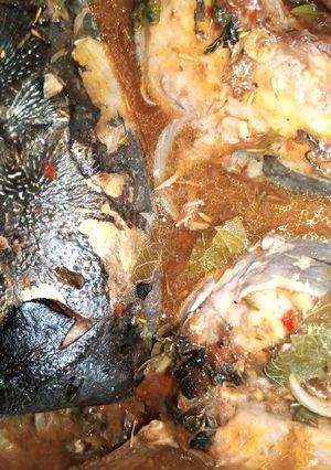 A picture of White rice and pepper soup.