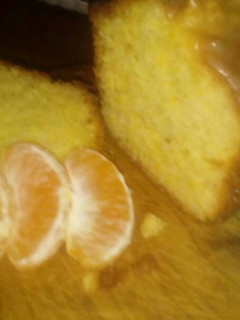 Una foto de Budín de mandarina húmedo y fácil