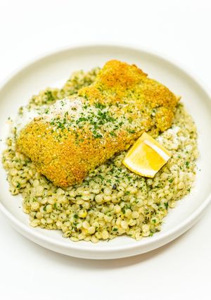 A picture of Pistachio Crusted Cod with Lemon Herb Pearl Couscous.