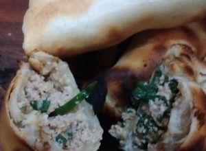 Una foto de Empanadas de ricota y verdeo al parrigas
